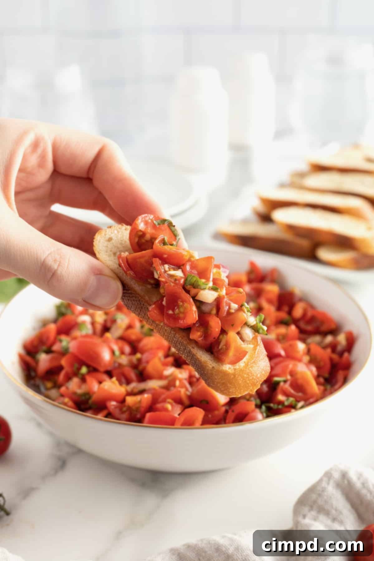 A vibrant spread of various appetizers, including Classic Tomato Bruschetta, for a party.