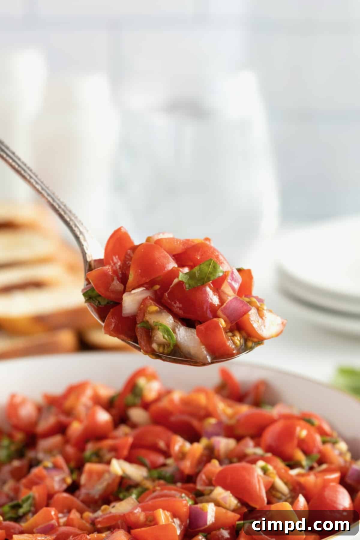 Close-up of freshly chopped ingredients for Classic Tomato Bruschetta.