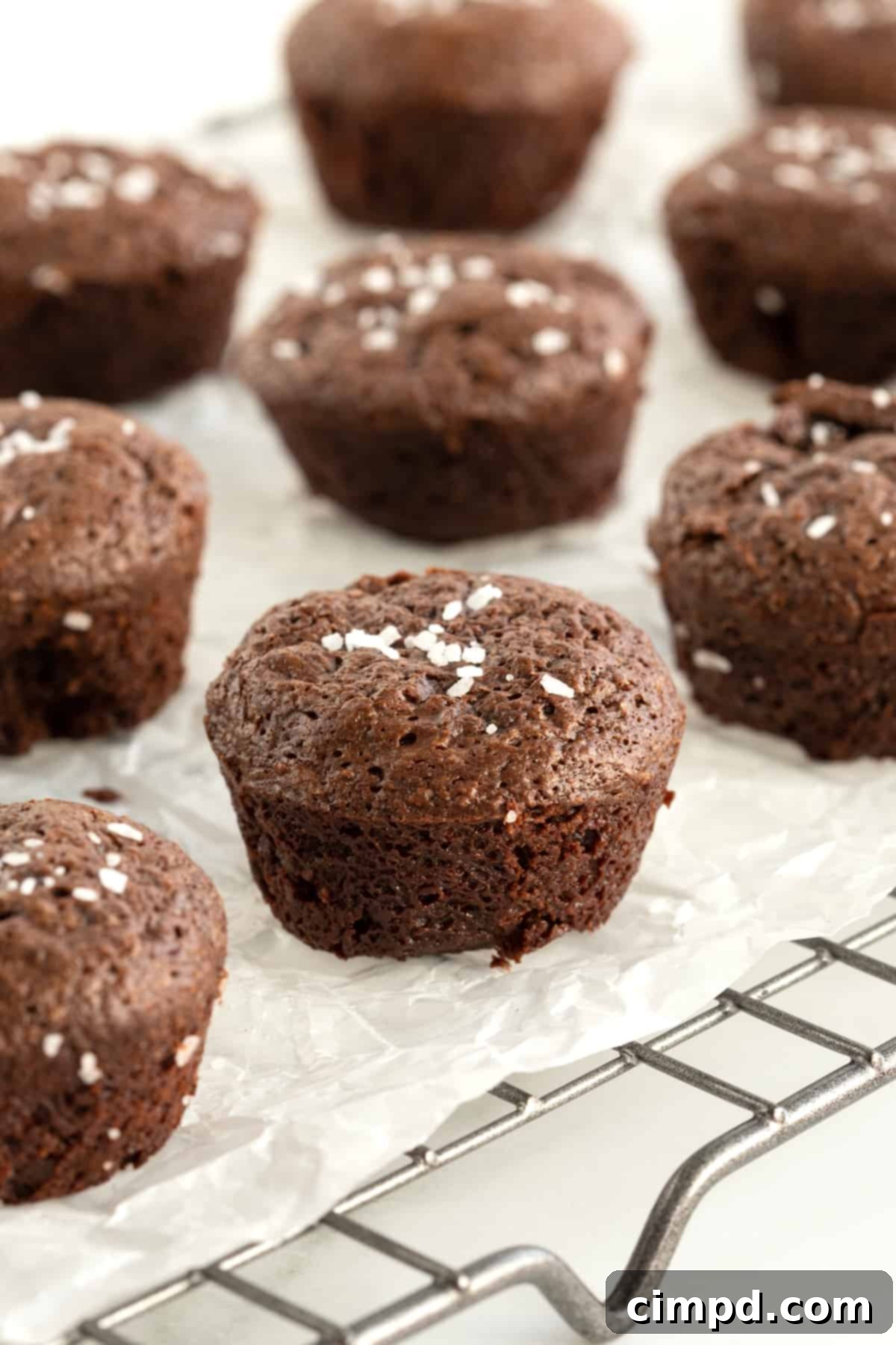 A baking sheet filled with freshly baked Flourless Fudge Brownie Bites