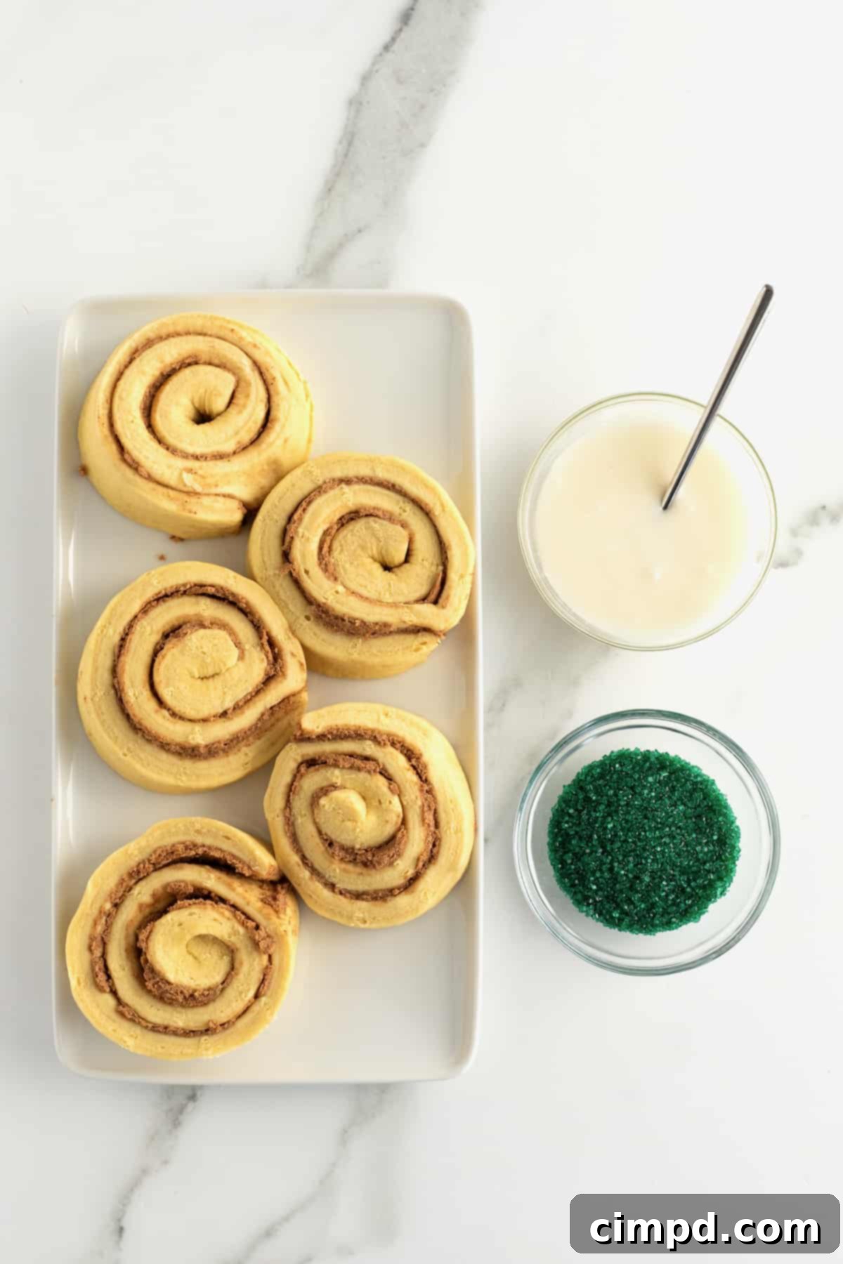 Ingredients for St. Patrick's Day Cinnamon Rolls laid out on a counter