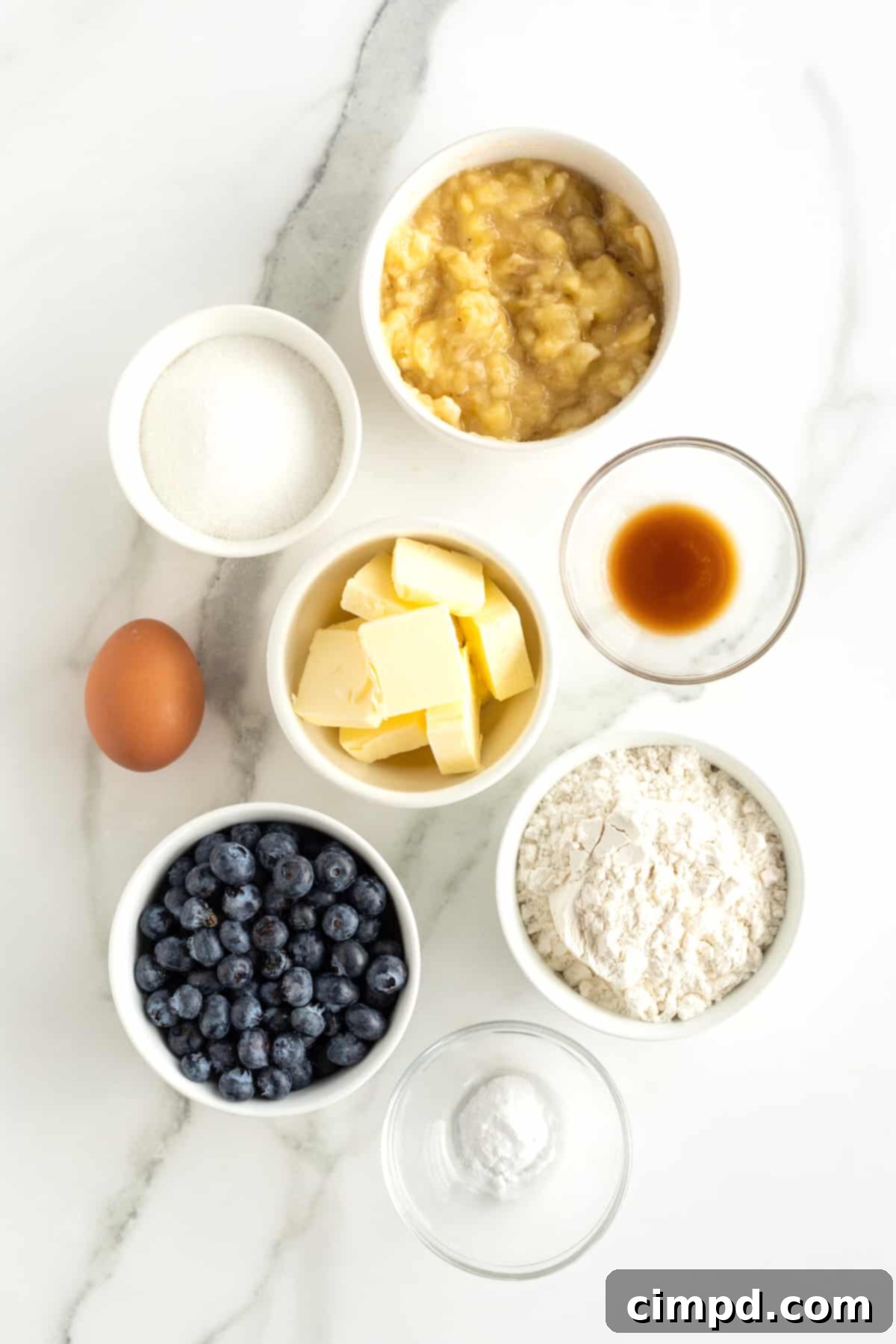Banana Blueberry Muffins by The BakerMama