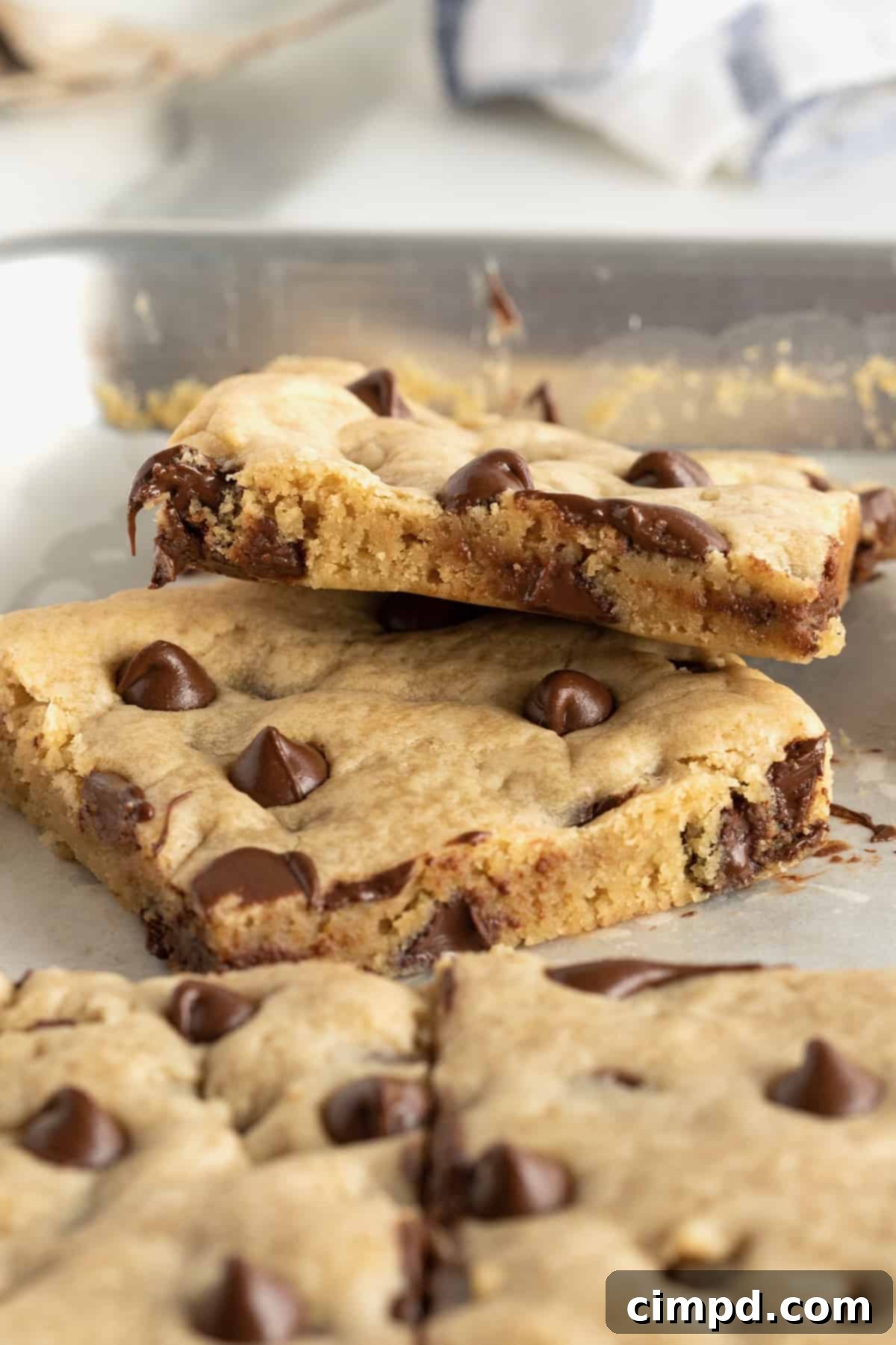 Sheet Pan Chocolate Chip Cookie Bars by The BakerMama