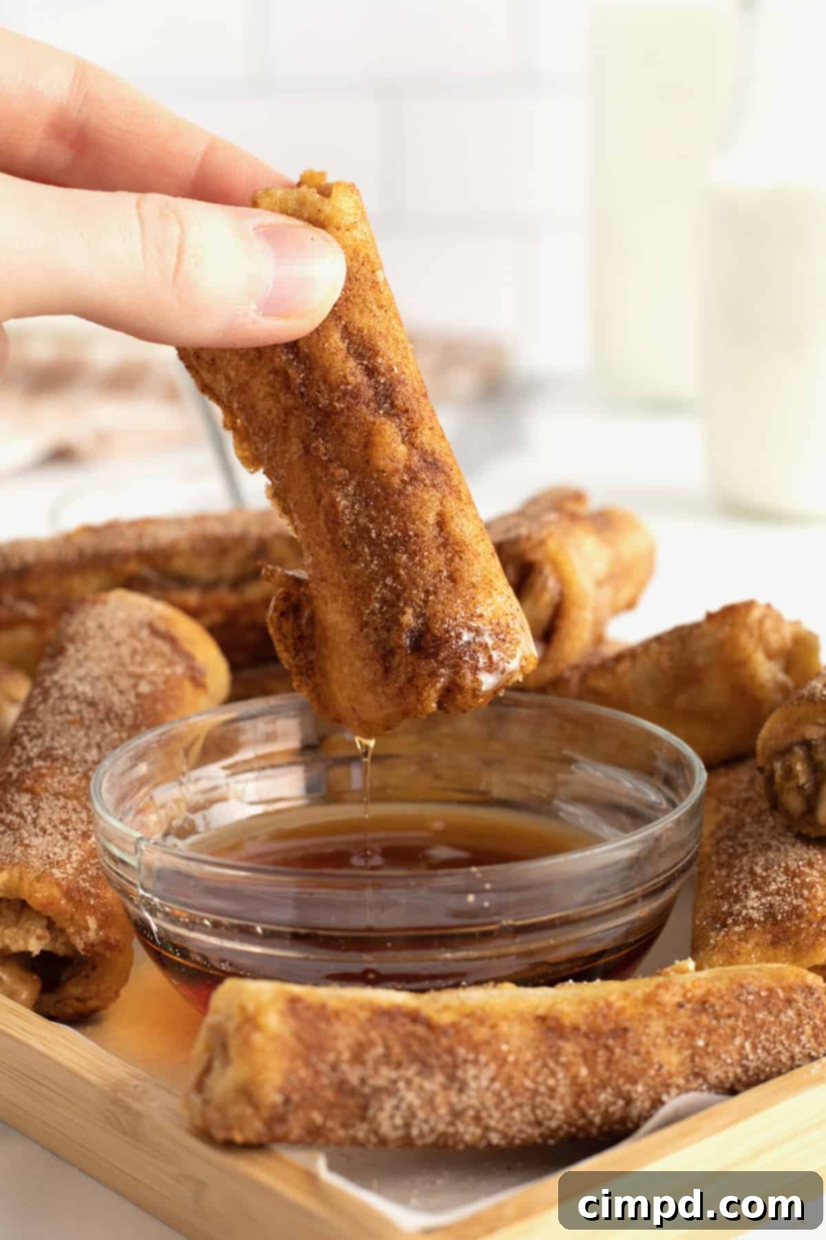 Close-up of a Peanut Butter Banana French Toast Roll Up, showing the peanut butter and banana filling.