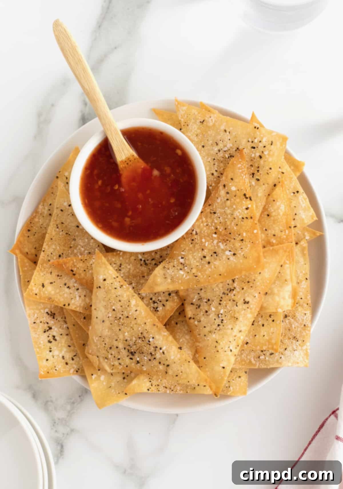 Crispy oven-baked wonton chips, golden brown and perfectly seasoned for dipping