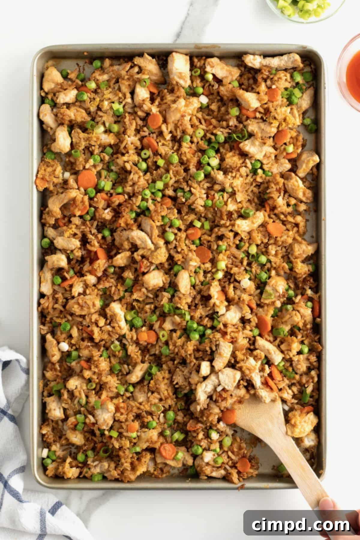 Delicious Sheet Pan Chicken Fried Rice by The BakerMama