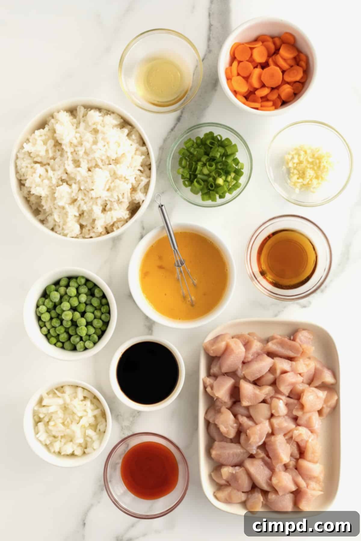 All ingredients for Sheet Pan Chicken Fried Rice laid out for preparation