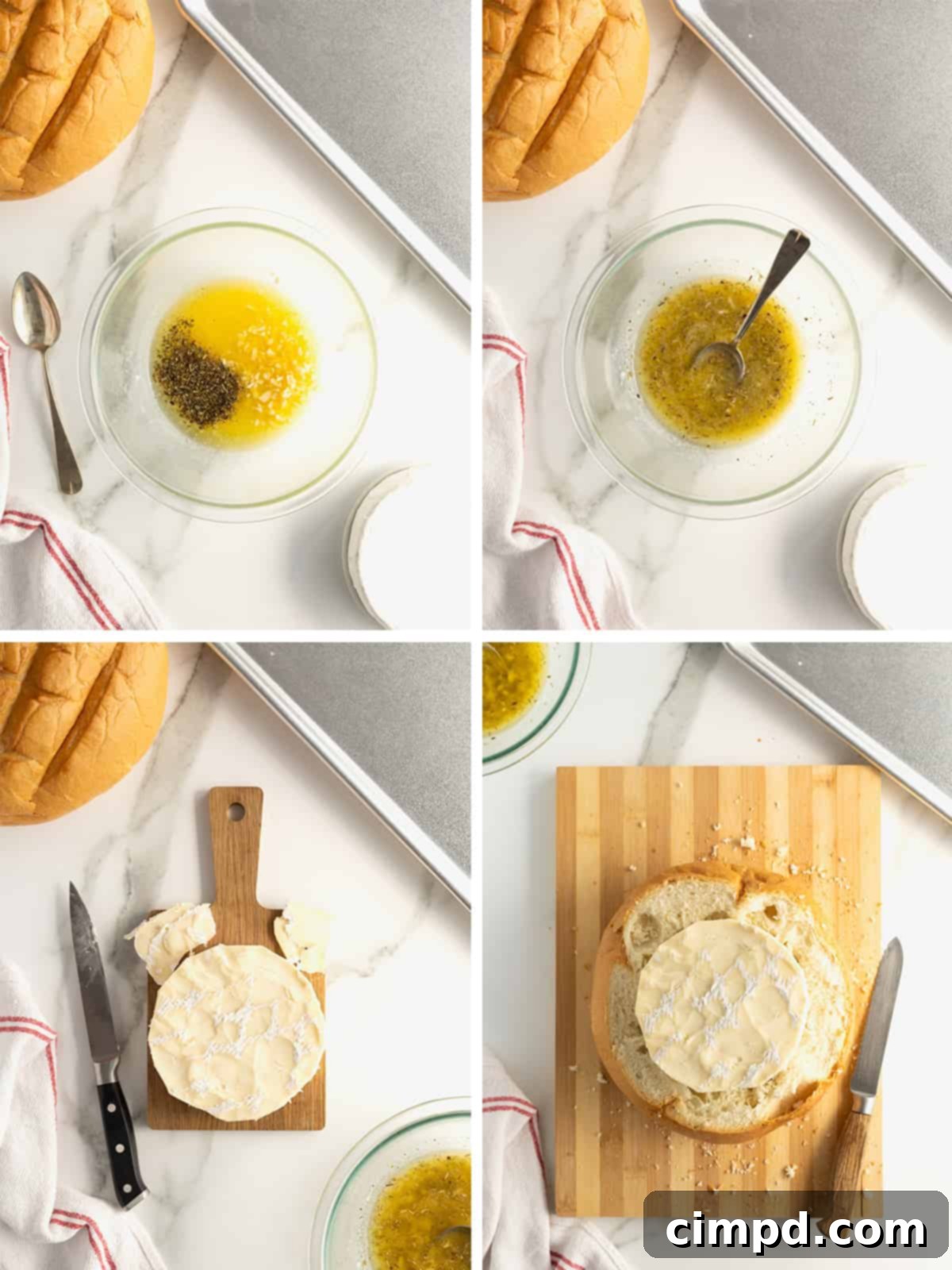 Melted butter and herbs, a sourdough loaf on a wooden cutting board.
