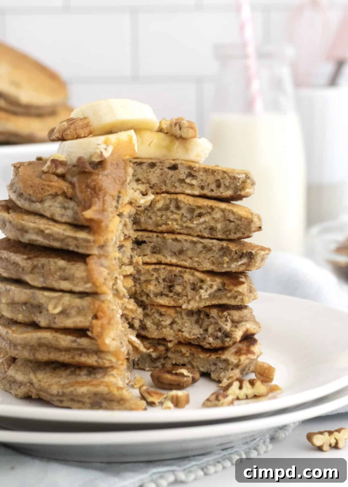 Wholesome Banana Nut Oat Pancakes 7 Variety of Whole Wheat Banana Nut Oat Pancakes, including a full stack and single servings