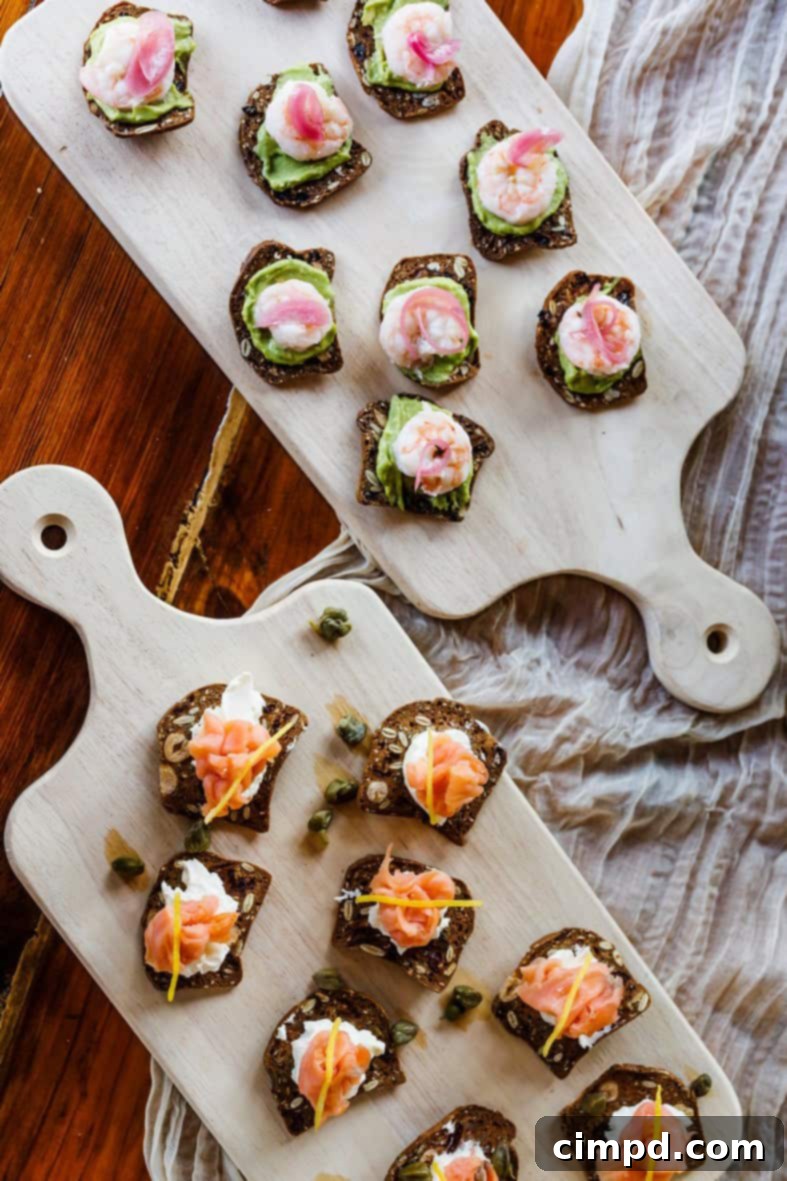 A close-up view of beautifully assembled cracker bites, showcasing intricate toppings and textures.
