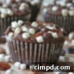 Rocky Road Brownie Cupcakes with melted chocolate, marshmallows, and pecans
