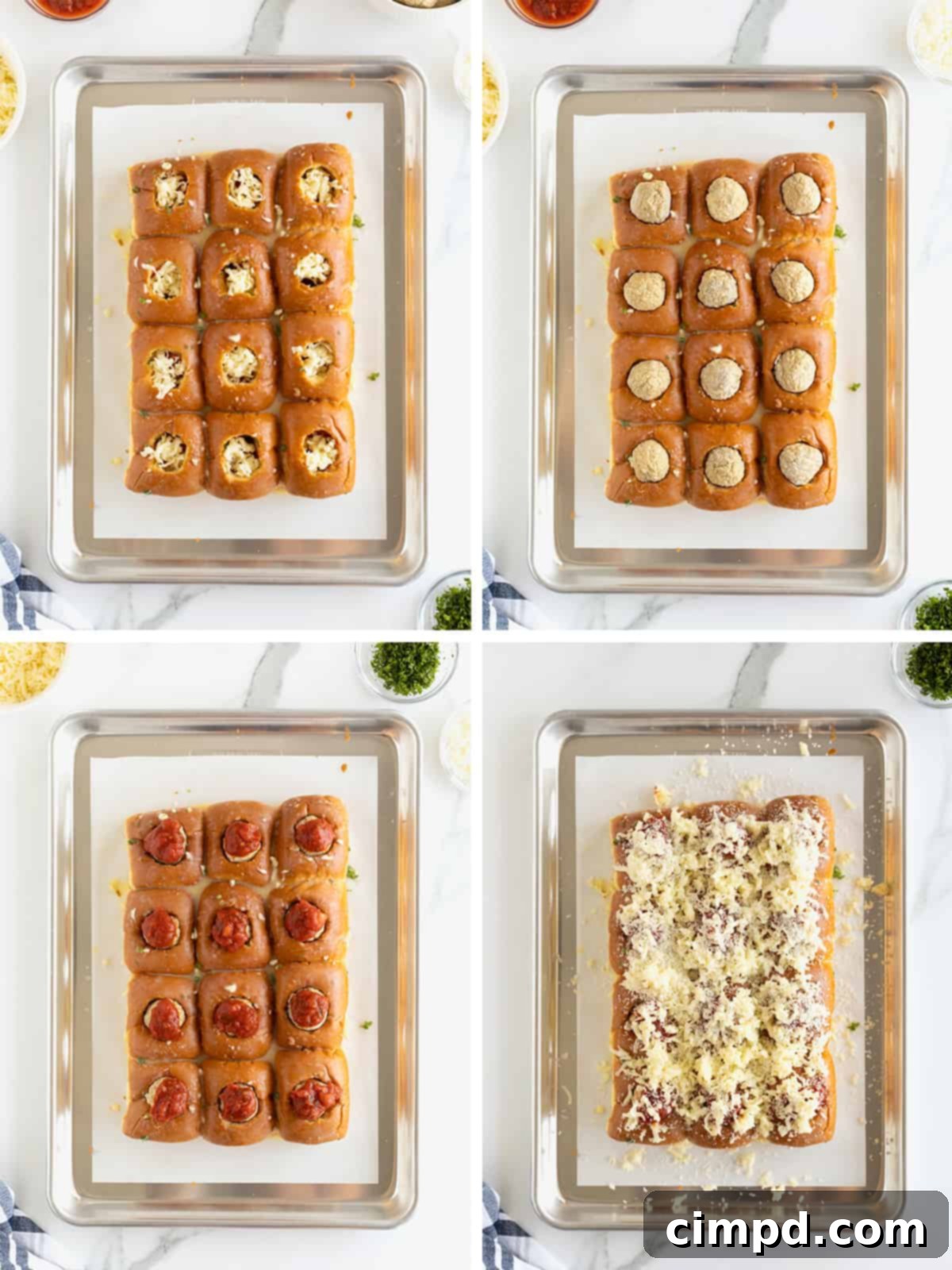 The final stages of preparing Meatball Stuffed Garlic Rolls before baking, showcasing the meatballs topped with sauce and generously covered with mozzarella and Parmesan cheese.