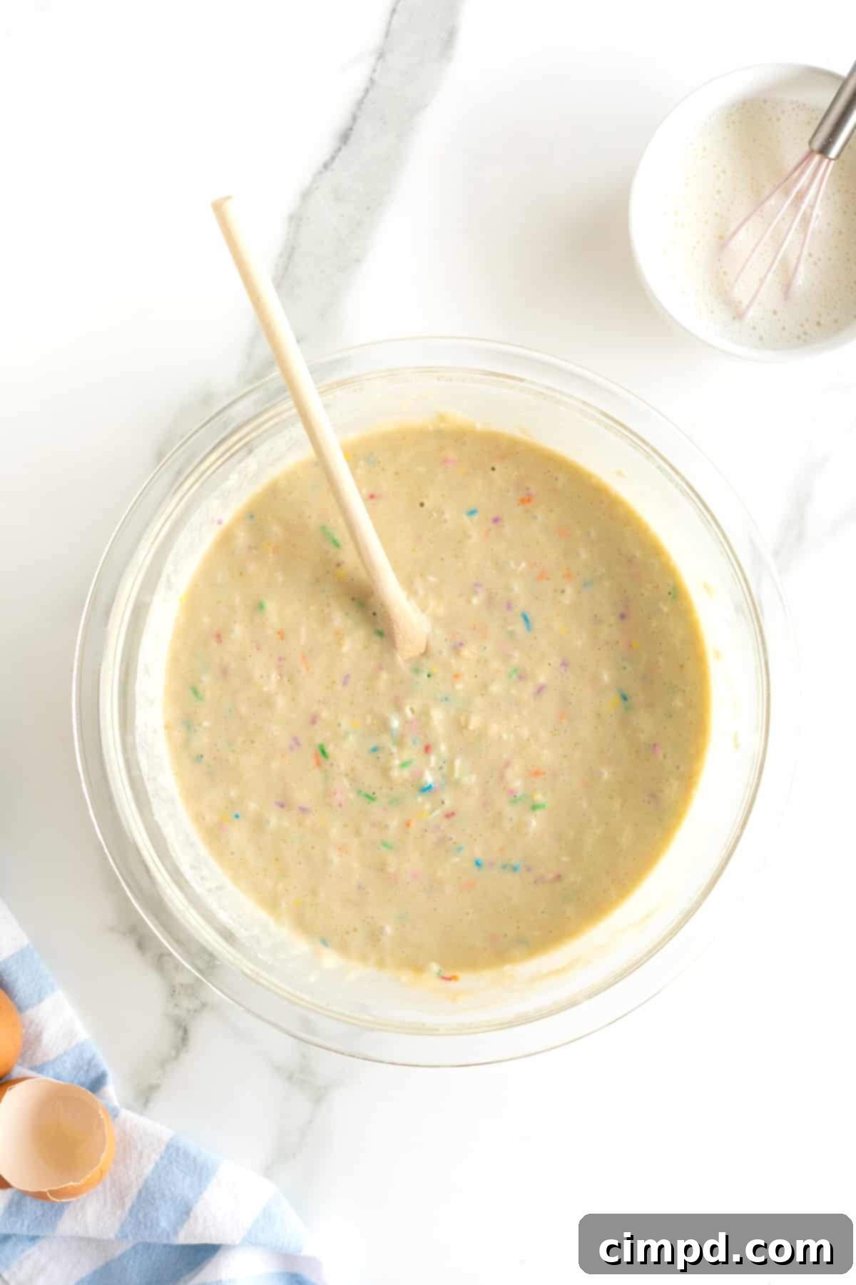 Pancake batter with rainbow sprinkles.