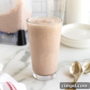 A clear glass filled with an homemade Wendy's frosty.