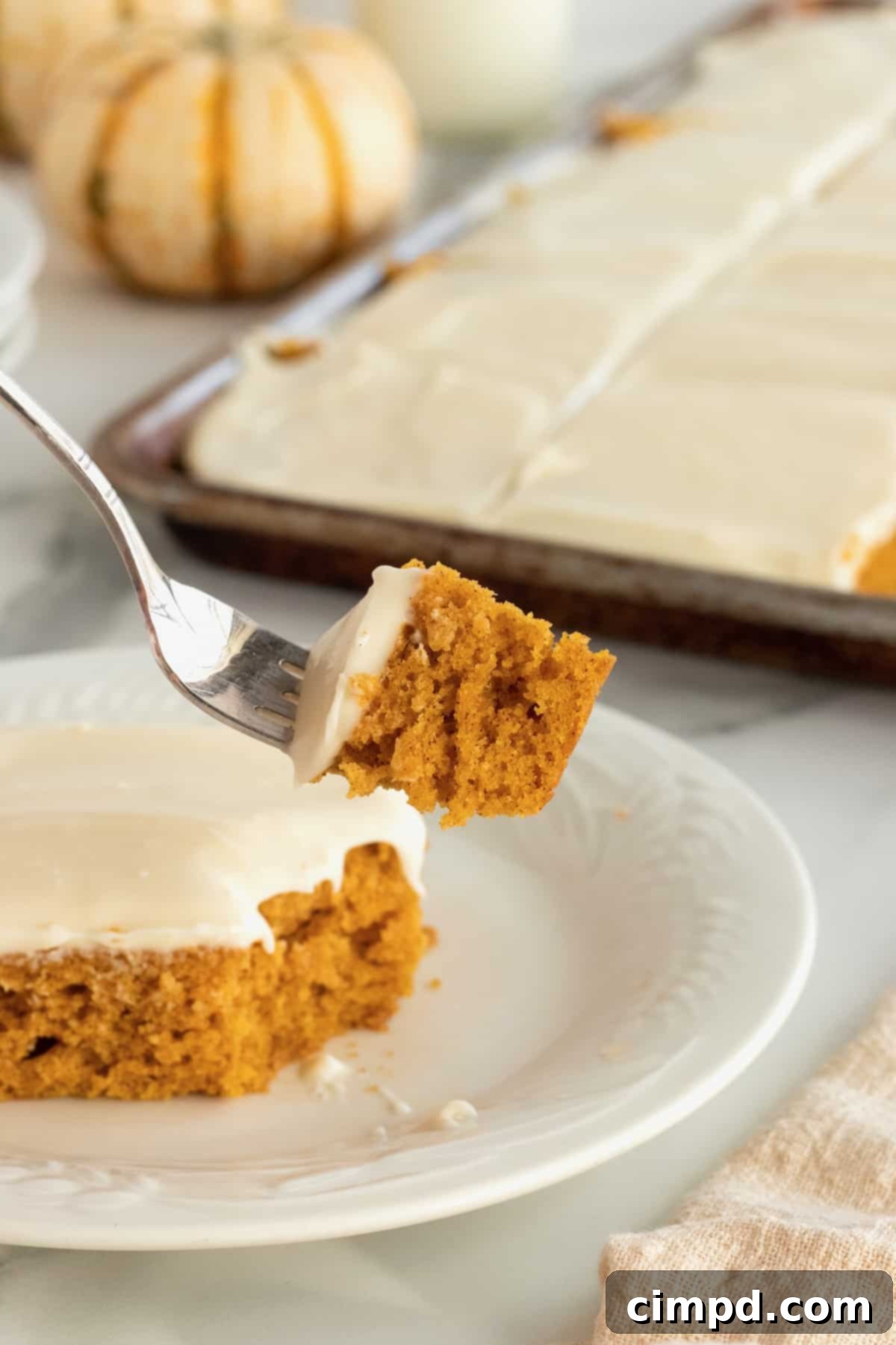 Spiced Pumpkin Slab Cake 3 Pumpkin Sheet Cake by The BakerMama