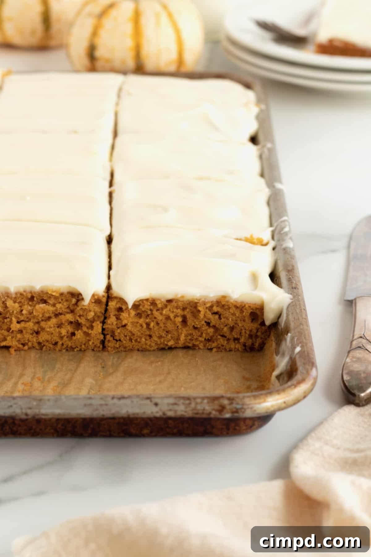 Spiced Pumpkin Slab Cake 10 Pumpkin Sheet Cake by The BakerMama