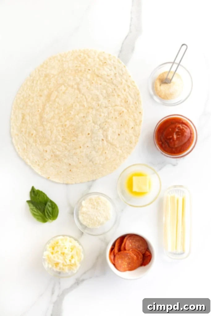 Tortilla Pizza with Stuffed Crust 6 A large flour tortilla next to small glass dishes of pizza ingredients on a white marble counter.
