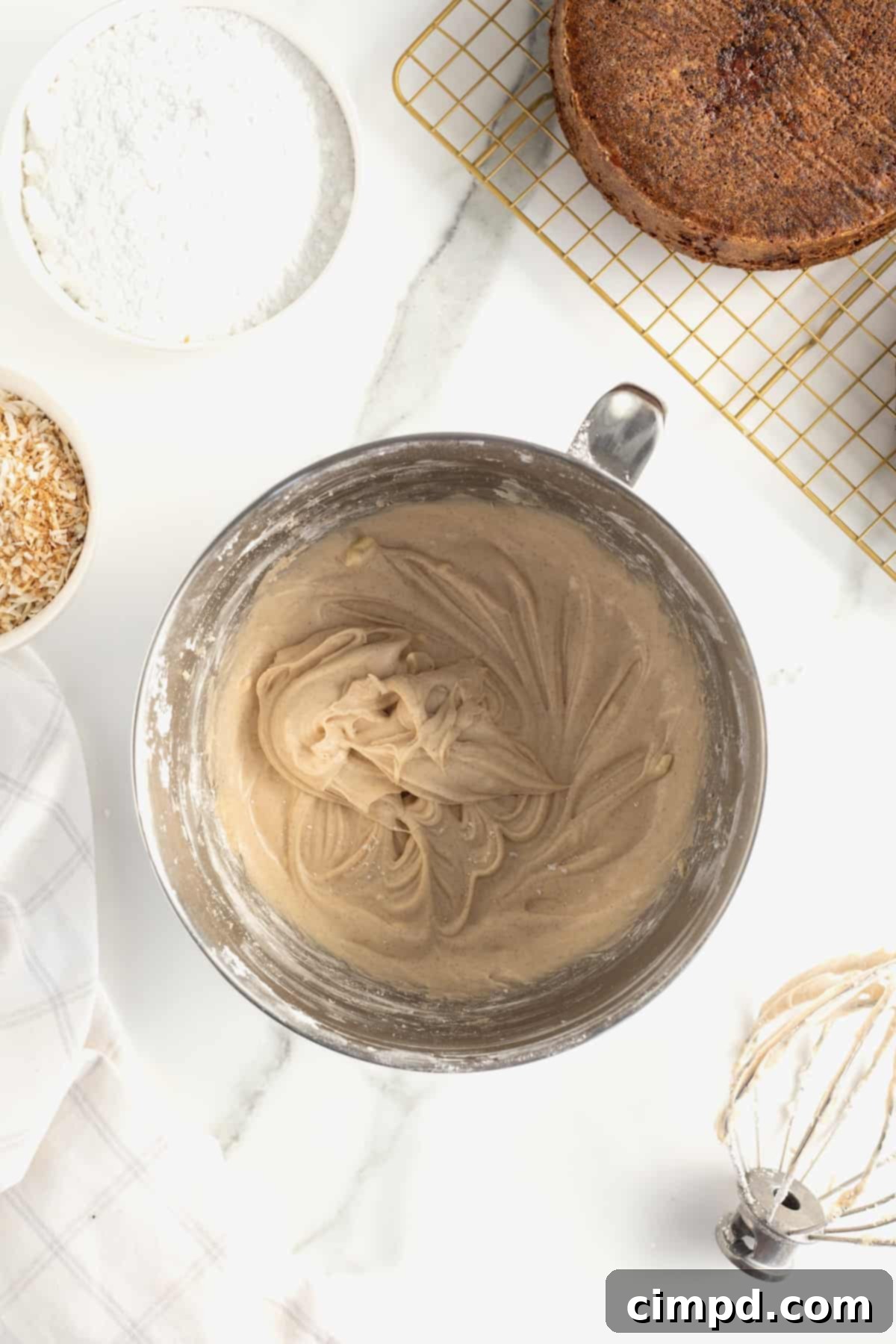 Warmly Spiced Carrot Coconut Cake with Tangy Cream Cheese Frosting 10 Coconut Carrot Cake with Cinnamon Cream Cheese Frosting by The BakerMama