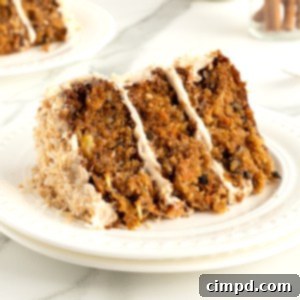 Warmly Spiced Carrot Coconut Cake with Tangy Cream Cheese Frosting 15 Coconut Carrot Cake with Cinnamon Cream Cheese Frosting by The BakerMama