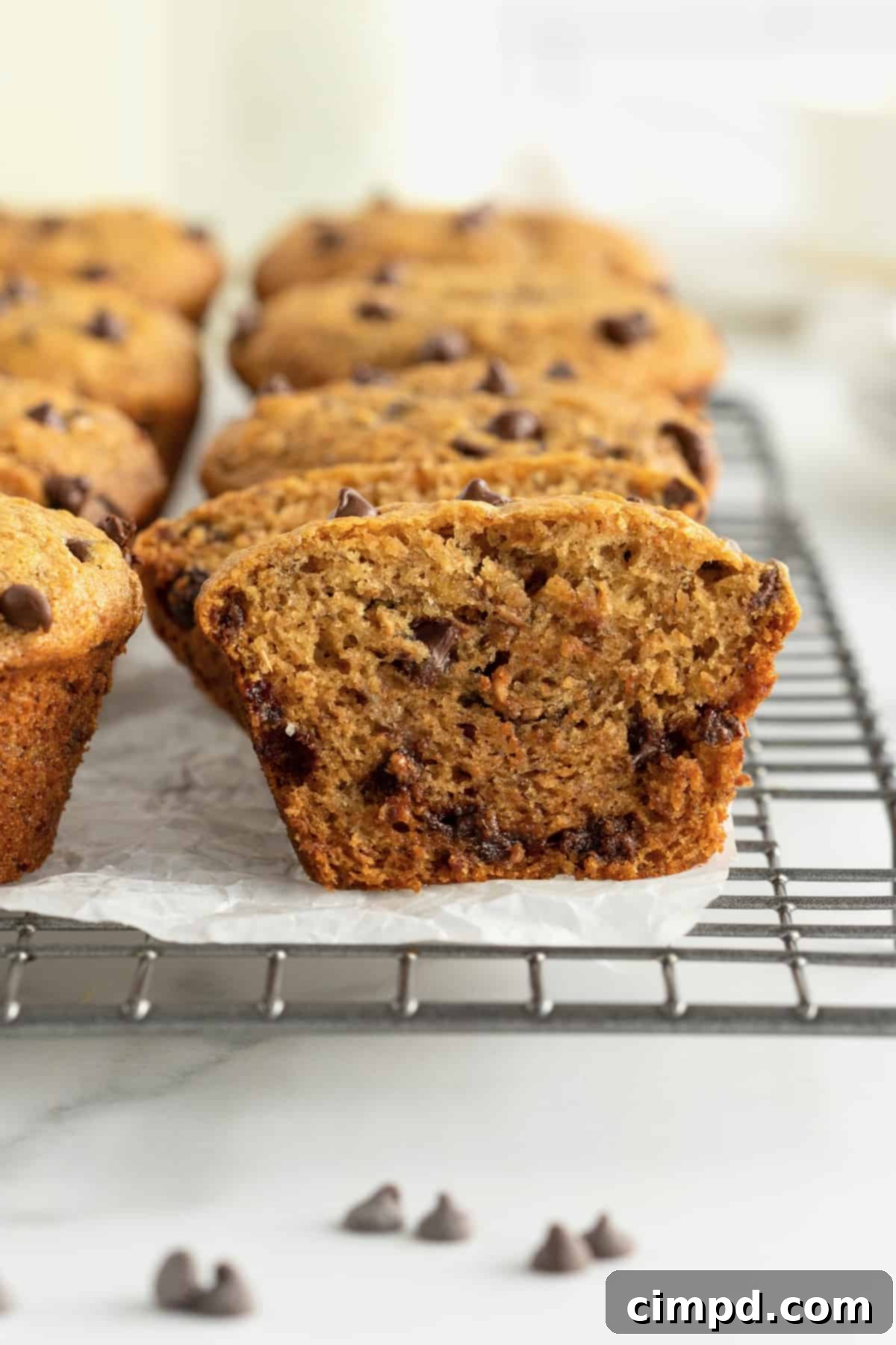 Experience the pure delight of Whole Wheat Peanut Butter Banana Chocolate Chip Muffins – a simple recipe yielding moist, flavorful, and satisfying results every time.