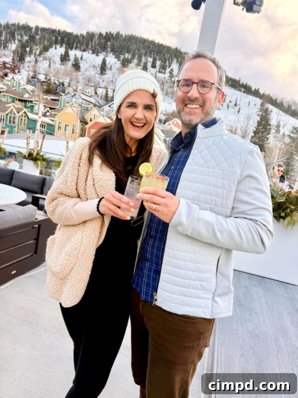 Maegan and Brandon enjoying cocktails on Park City Main Street after a day of skiing.