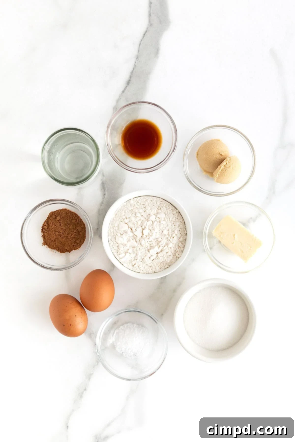 Guilt-Free Baked Churros 6 Ingredients to make baked churros in small glass dishes on a white marble counter.