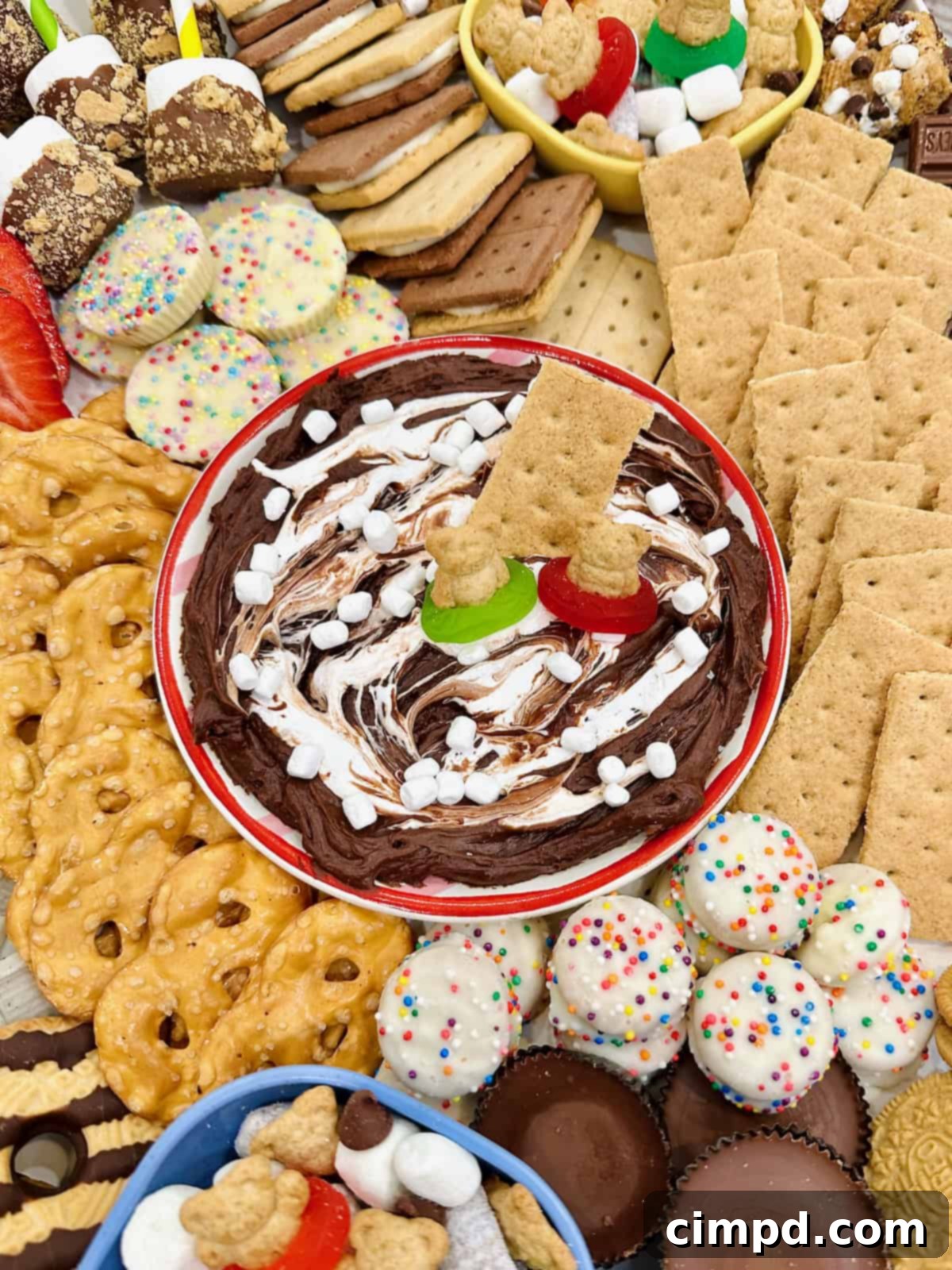 Kids Summer Smores Fun Board 6 A rich and creamy S'mores dip takes center stage on a beautifully assembled summer s'mores board, inviting guests to indulge.