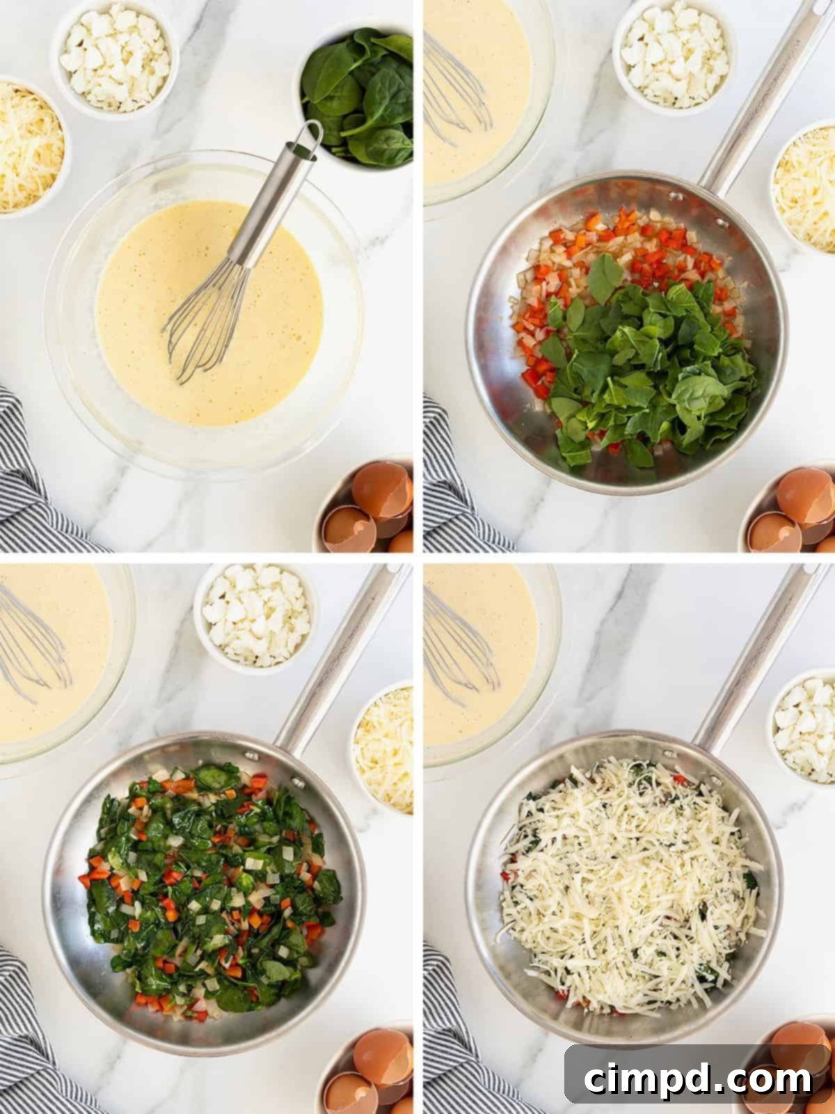 Mid-preparation stage of a spinach, goat cheese, and red pepper frittata, showing vegetables and cheese layered in a skillet.