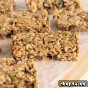 Six power bars on a parchment lined wooden board.