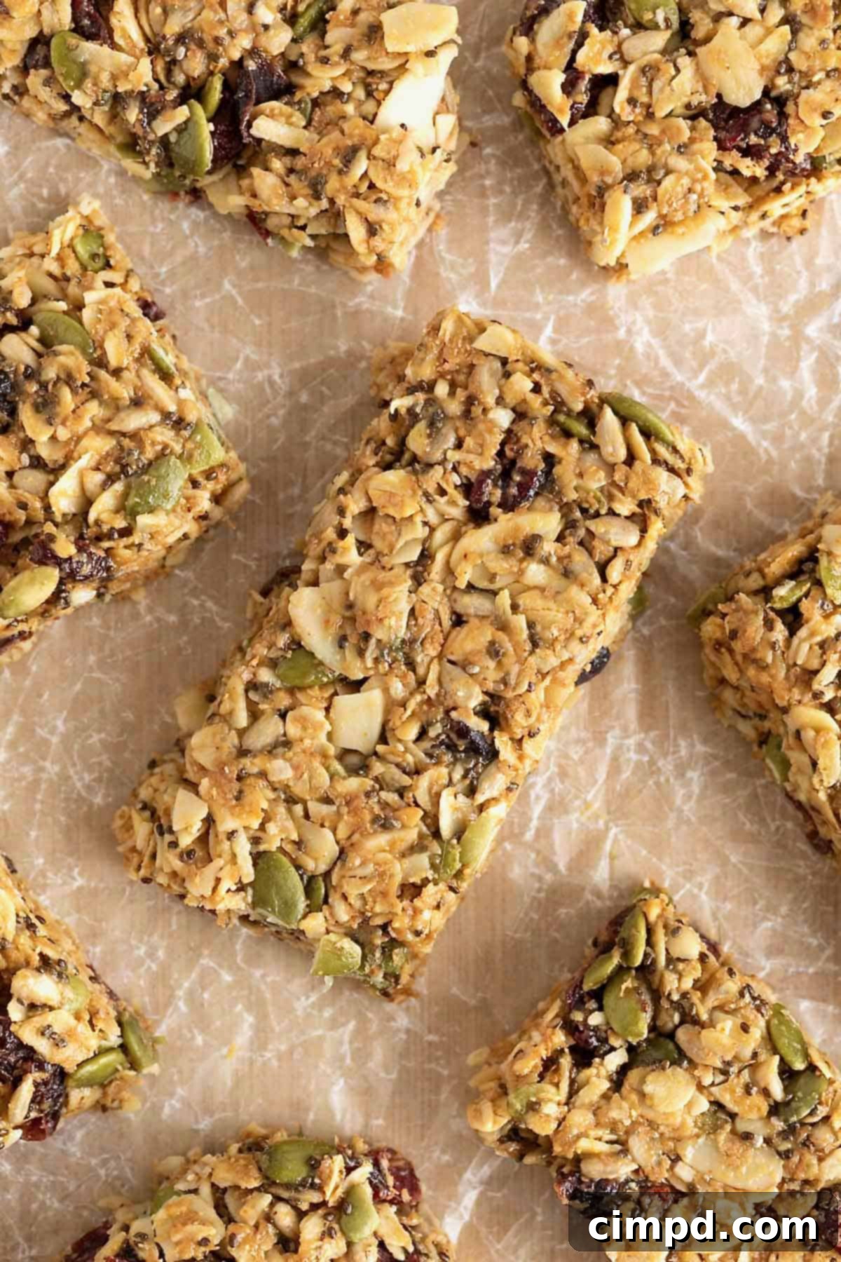 An inviting arrangement of wholesome snack bars on a rustic wooden cutting board, highlighting their natural appeal.