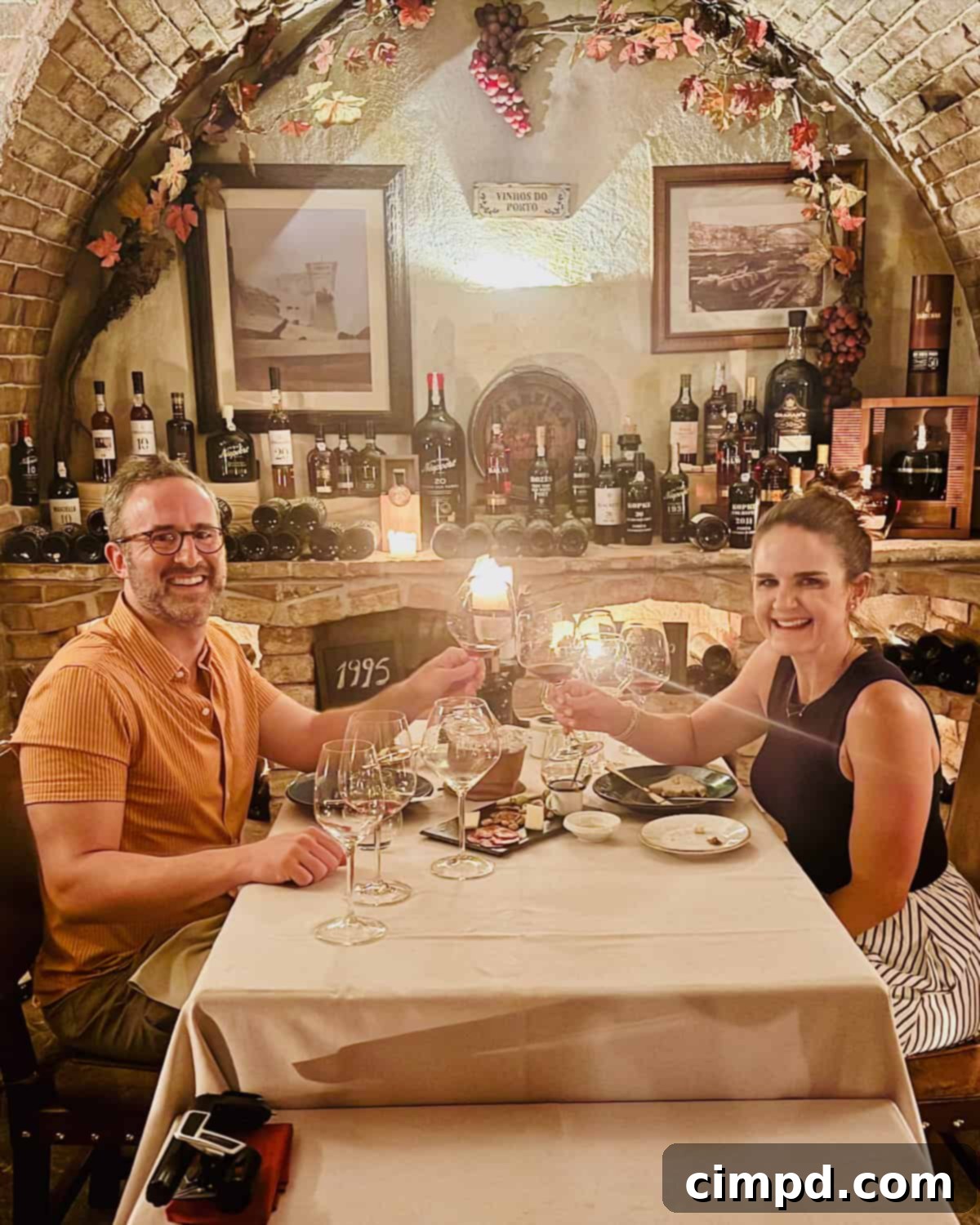 Maegan and Brandon Brown enjoying a private wine tasting in a luxurious wine cave at Vila Vita Parc, Algarve, Portugal.