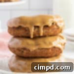 Whole Wheat Baked Banana Donuts with a Peanut Butter Glaze by The BakerMama