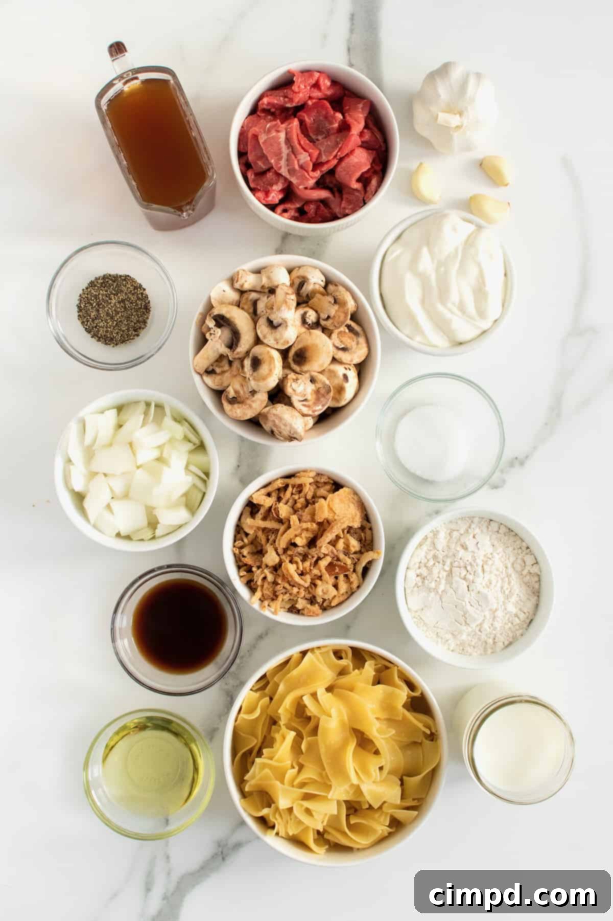 Ingredients for Beef Stroganoff Casserole laid out on a table
