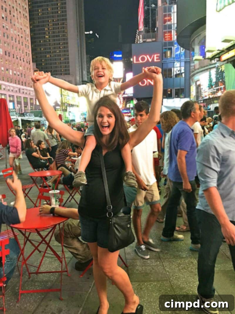 Times Square at night, illuminated by bright billboards
