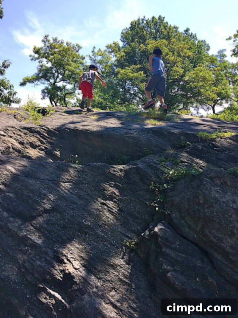 Children climbing rocks in Central Park