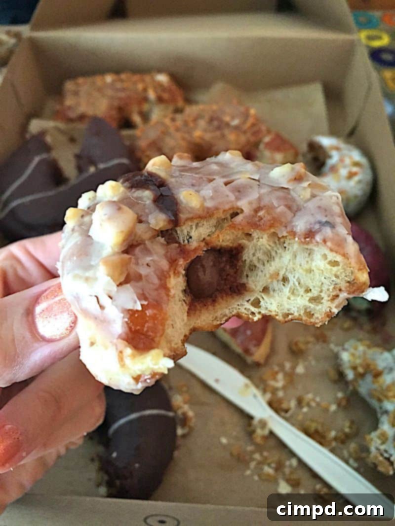 Close-up of three delicious Doughnut Plant doughnuts