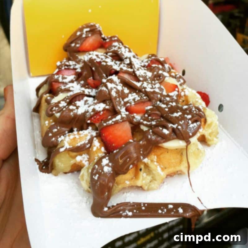 Delicious Belgian waffle with fruit and Nutella from Wafels & Dinges