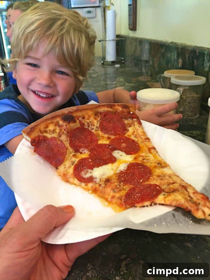 Classic New York style pizza slices from Patzeria Perfect Pizza