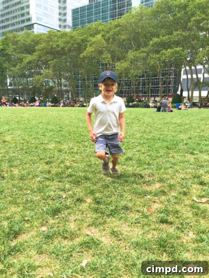 Children playing in Bryant Park with adult supervision