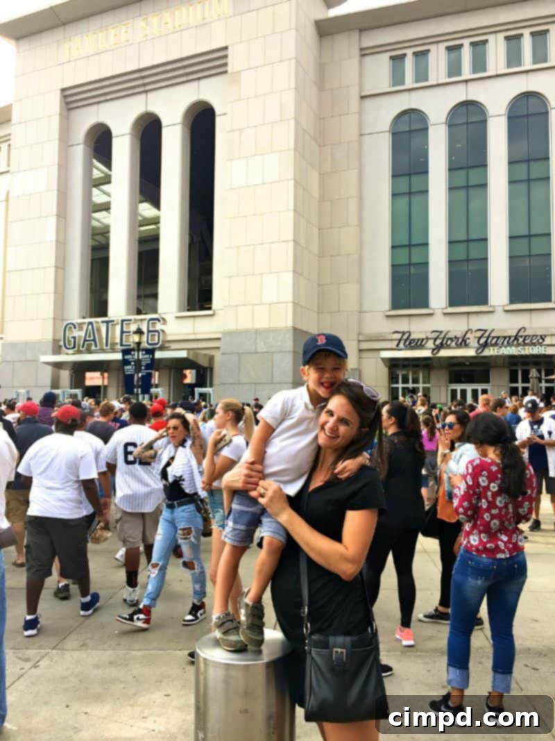 Baker wearing a Red Sox hat at Yankee Stadium