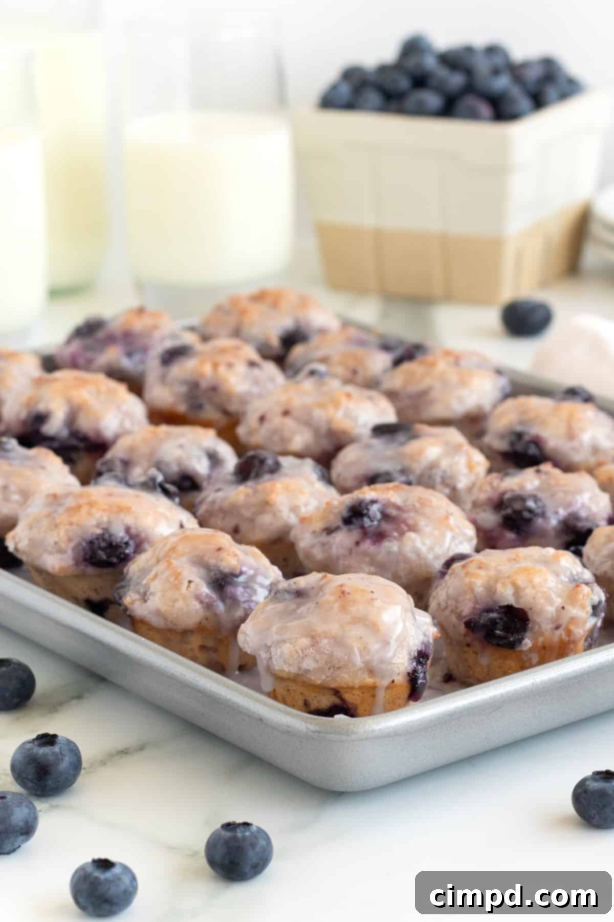 Oven-Baked Blueberry Fritter Poppers 8 A collage of various baked fritter flavors, showcasing different seasonal options.