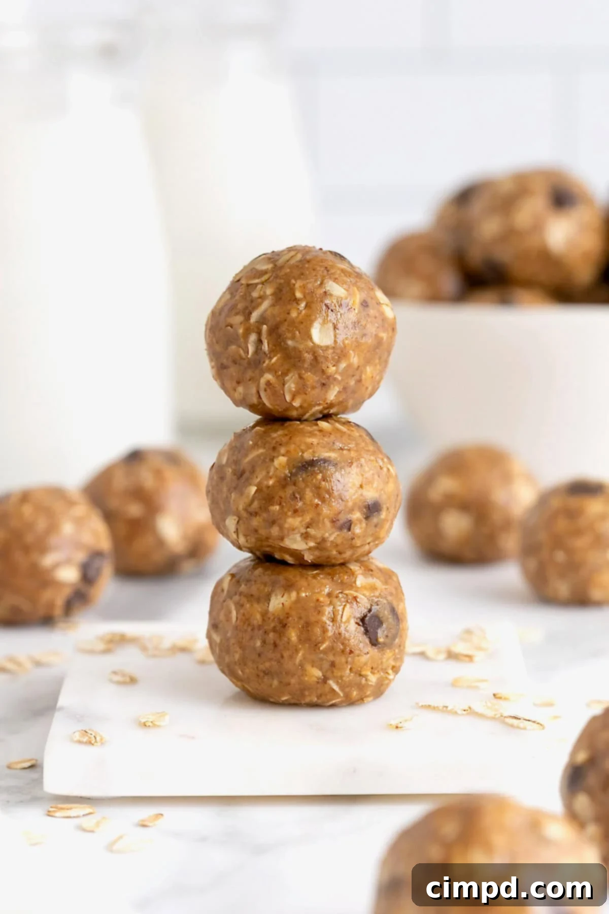 A stack of three lactation bites on a white surface.