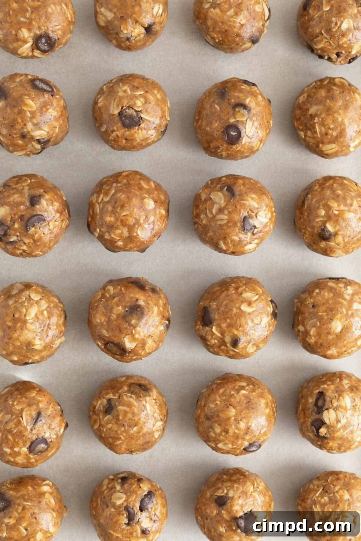 No-bake lactation bites on a parchment lined surface.