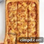 Tray-Baked Pizza Perfection 9 Sheet Pan Pizza by The BakerMama