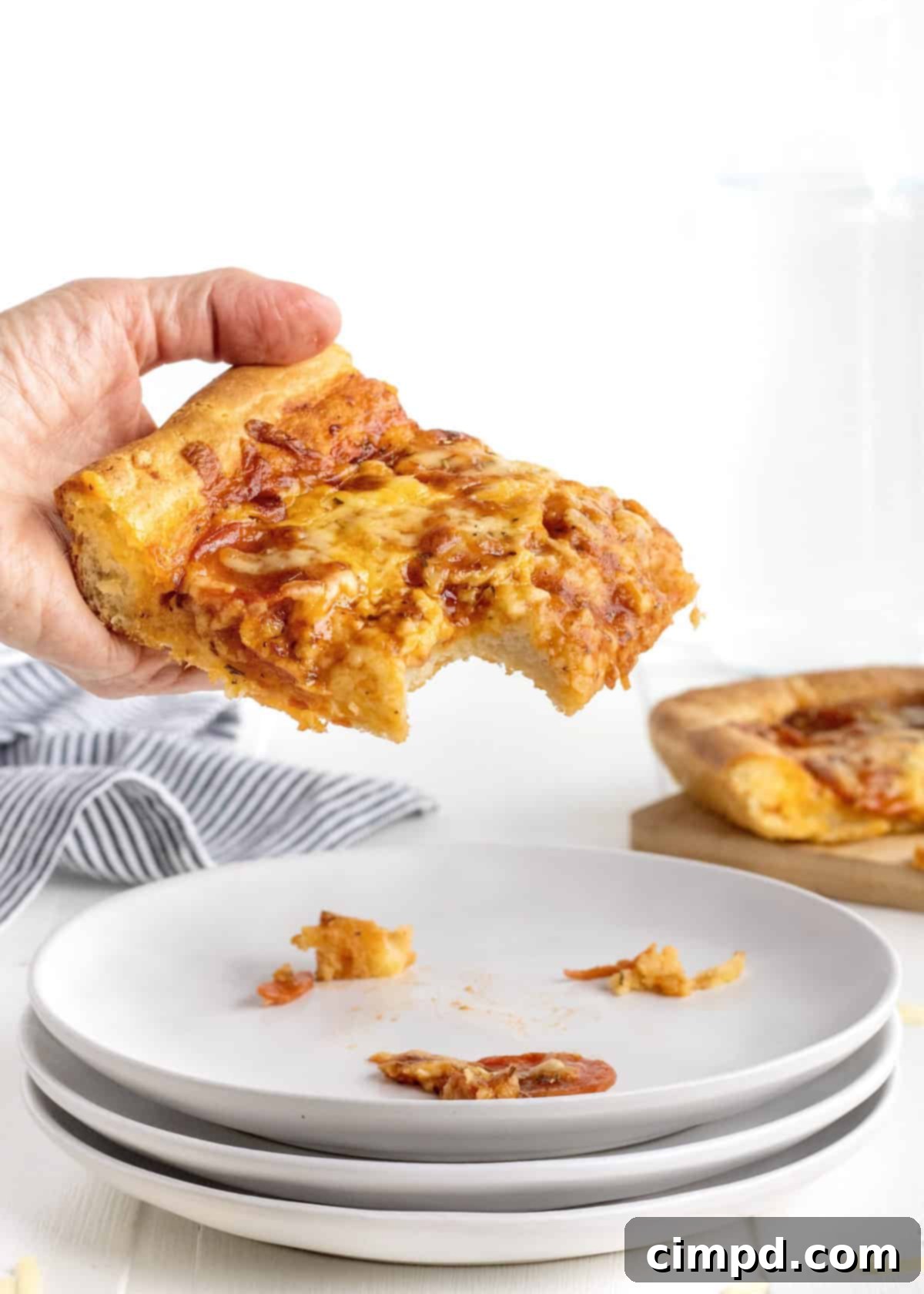 Tray-Baked Pizza Perfection 3 Sheet Pan Pizza with generous pepperoni and cheese before baking