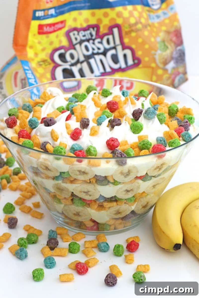 Full view of Berry Colossal Crunch Banana Pudding with spoon