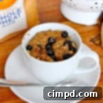 Quick Blueberry Banana Mug Muffin 2 Thumbnail image of Microwave Blueberry Banana Muffin in a Mug