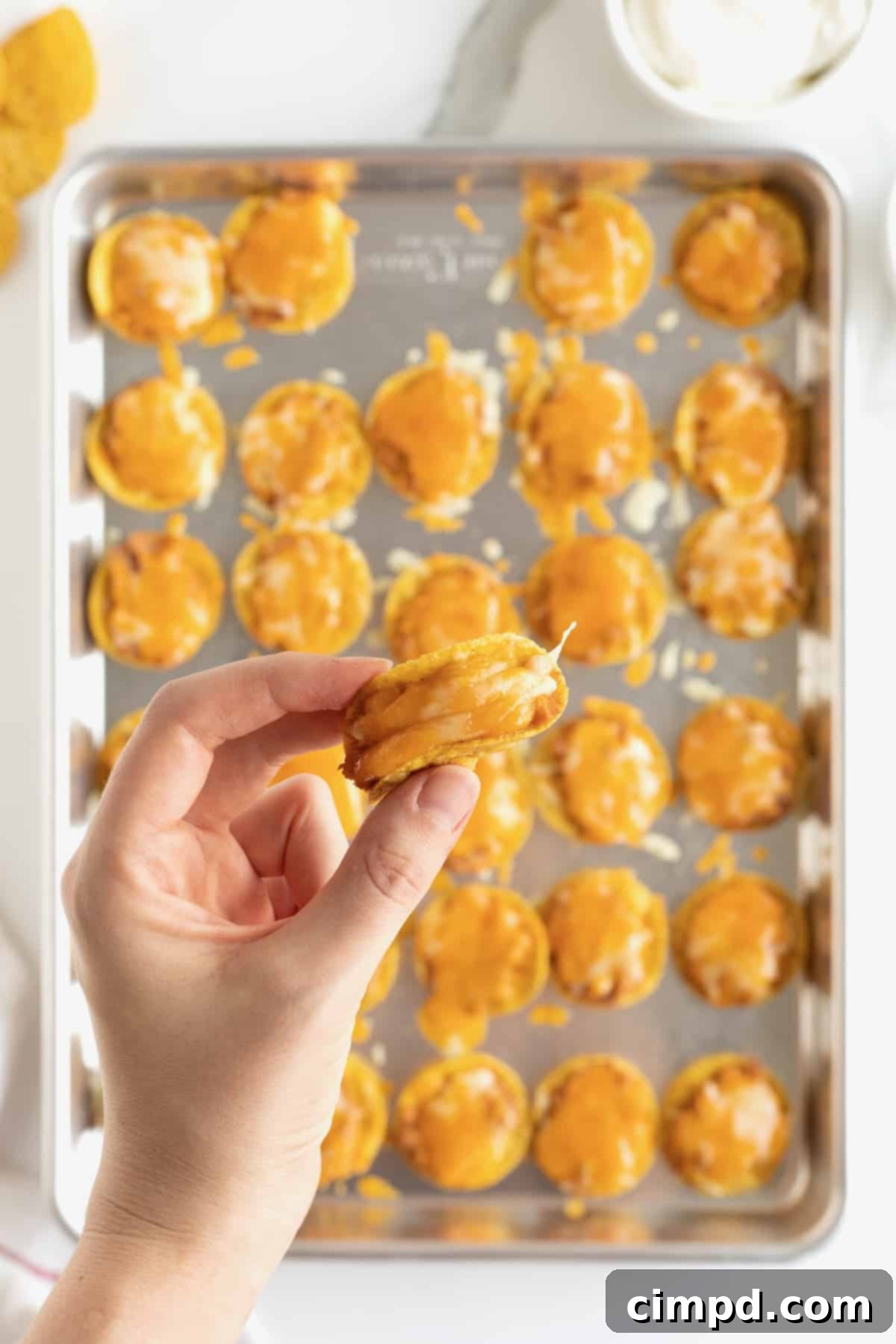 How to fold a bean and cheese taco bite.