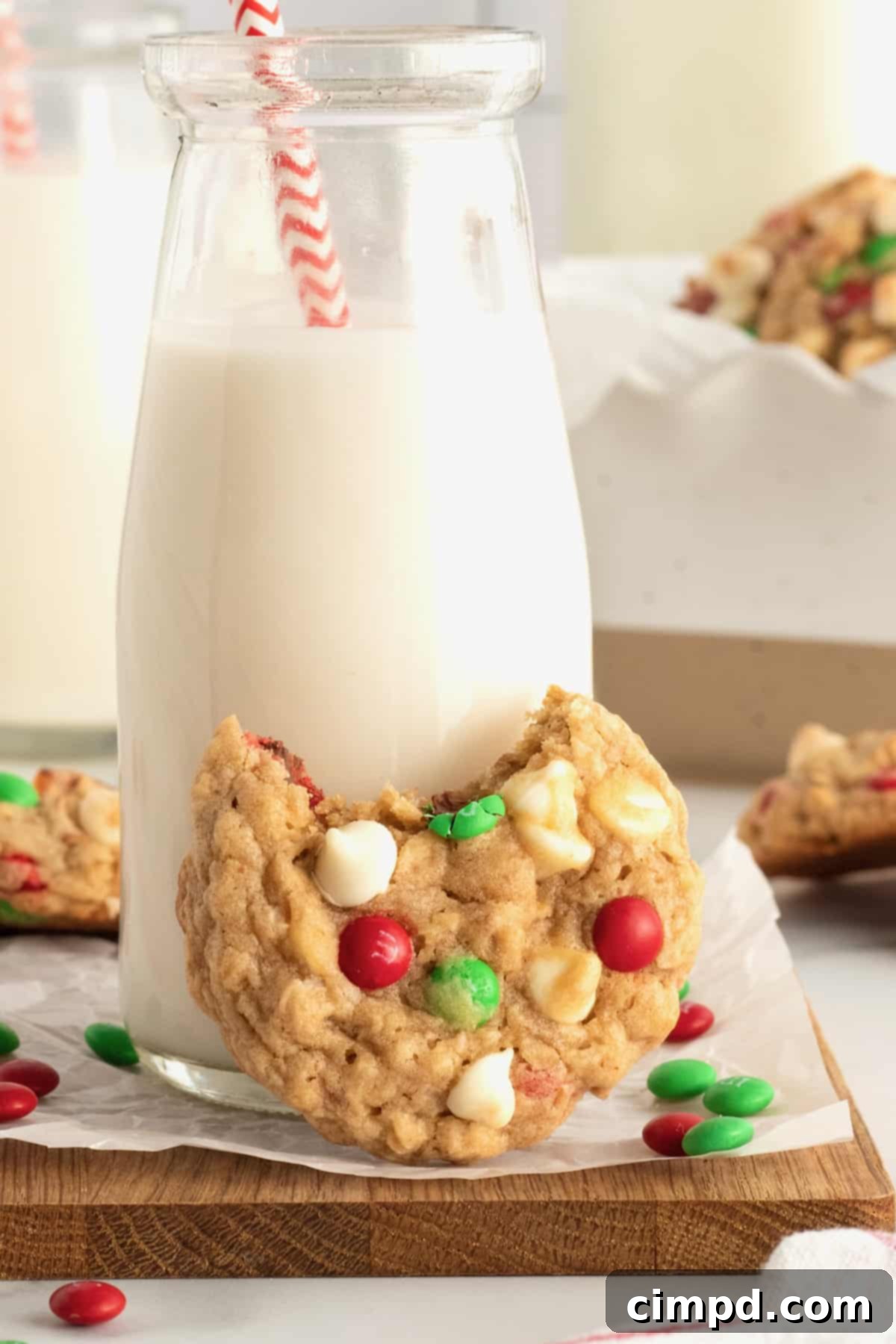 A close-up of a stack of Sleigh Mix Cookies, showcasing the rich texture and colorful mix-ins.