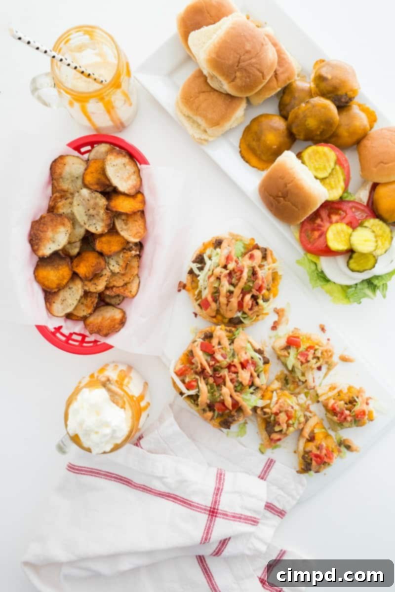 A visually appealing spread of food items from the 'Burger Night Done Right' menu, including sliders, chips, and milkshakes.