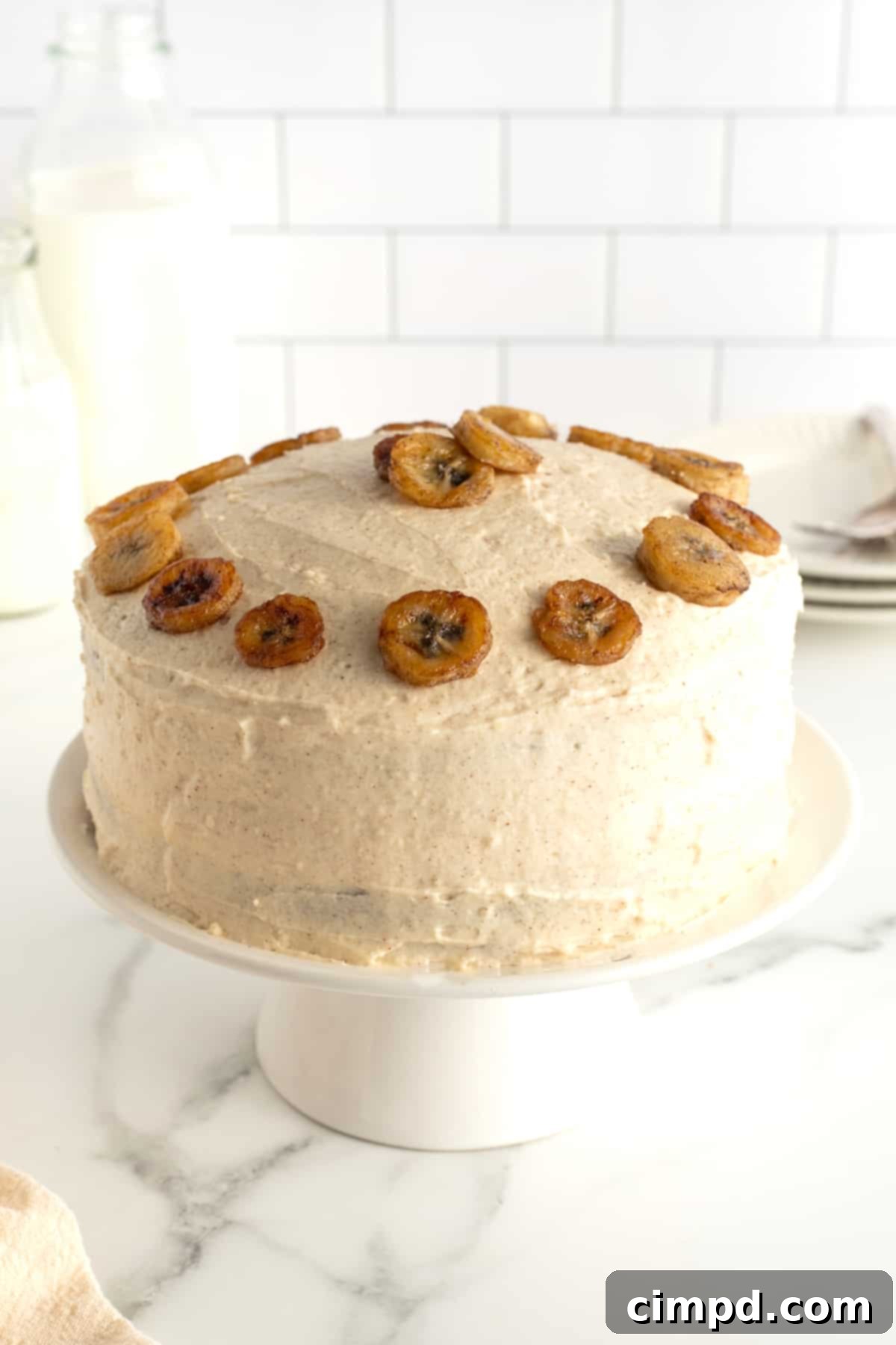 Nutty Brown Butter Banana Cake 5 Homemade Banana Cake with Brown Butter Frosting on kitchen counter